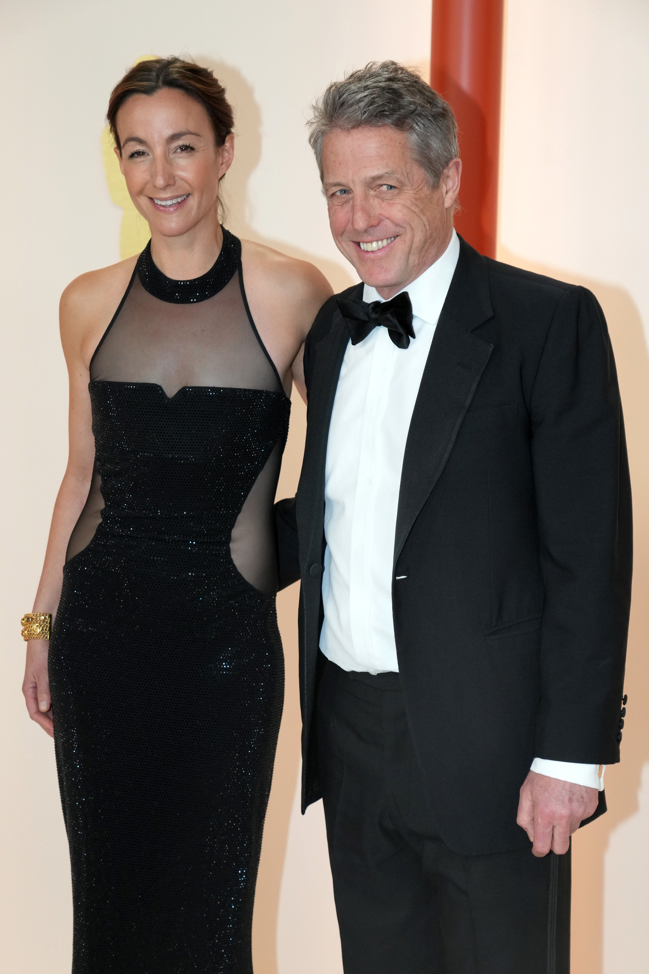 Hugh smiling with wife Anna Eberstein