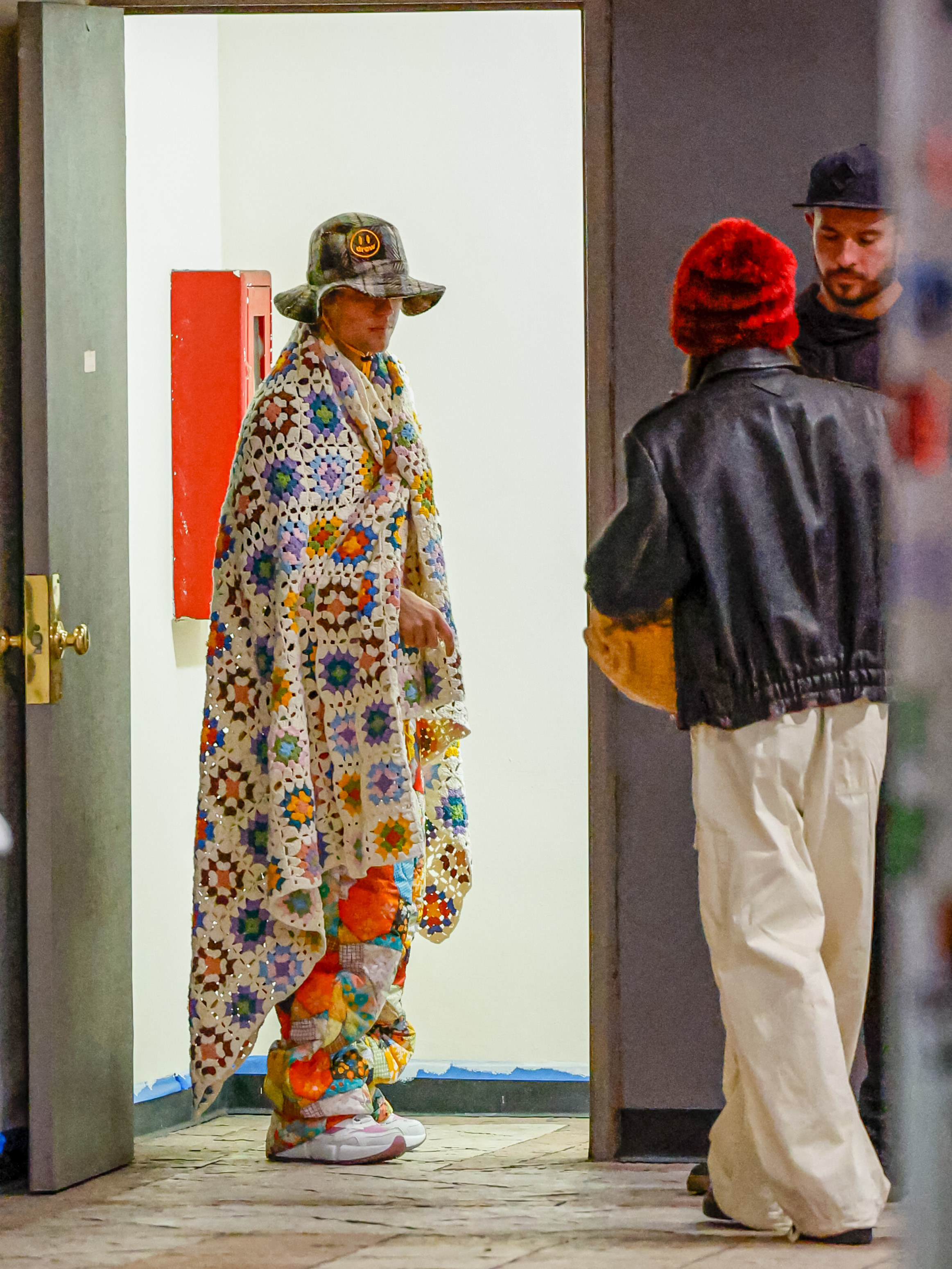 Justin Bieber wearing a blanket