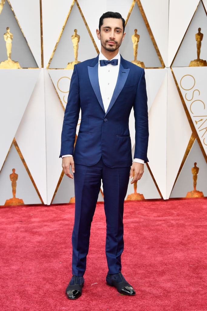 Riz on the red carpet in a bow tie