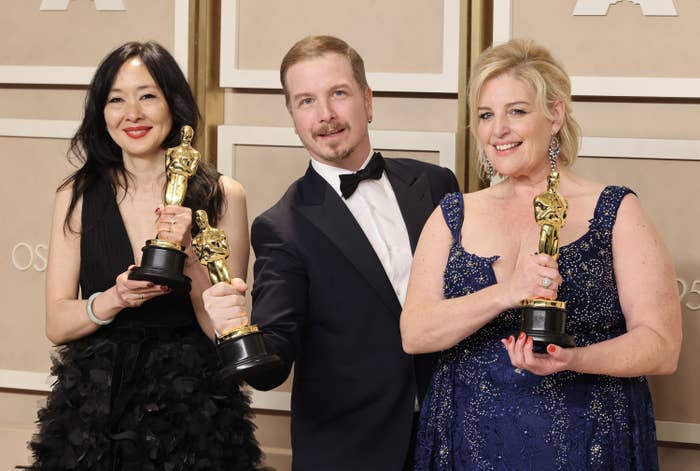 From left to right: Judy, Adrien, and Annamarie pose with their Oscars backstage