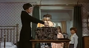 Mary Poppins pulling out a lamp from her bag