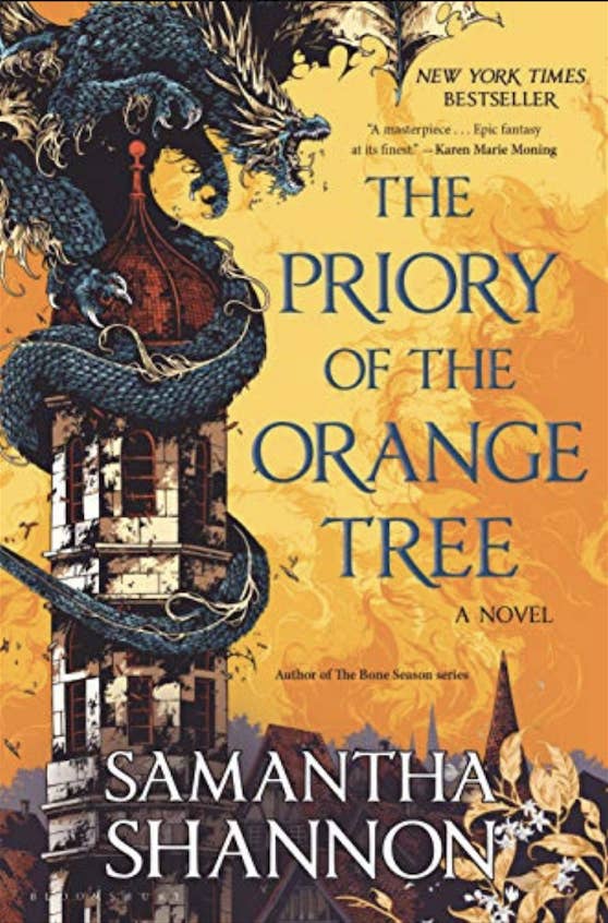book cover with a dragon on a tower