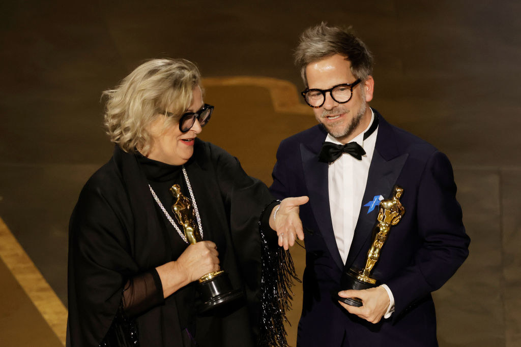 Ernestine Hipper and Christian M. Goldbeck accept the Best Production Design award for &quot;All Quiet on the Western Front&quot; onstage