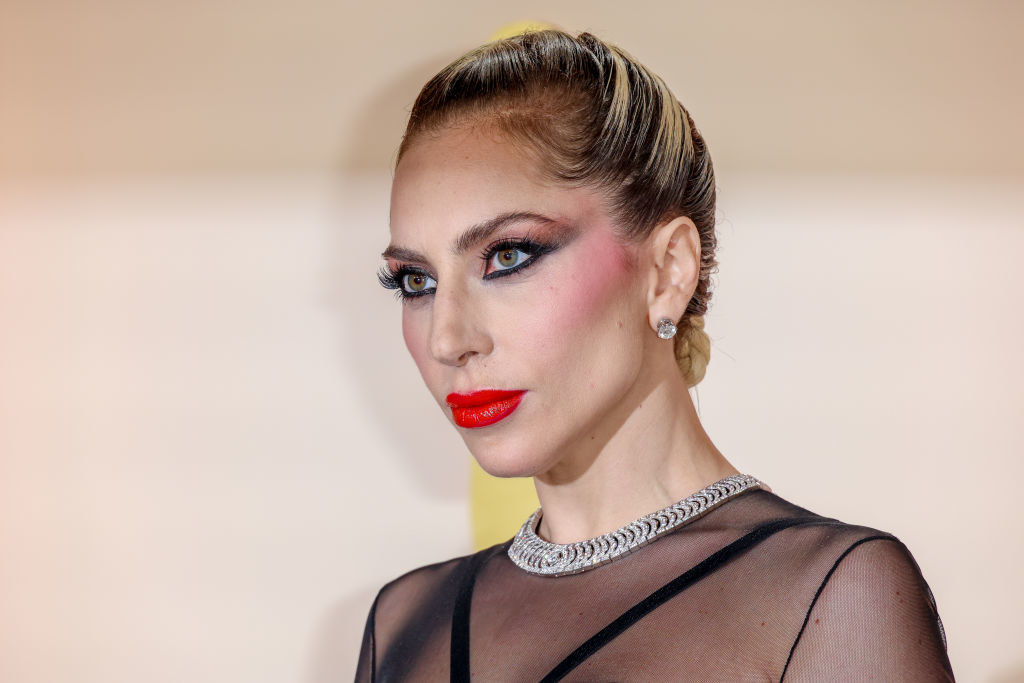 Close-up of Lady Gaga with bright cheeks and lips and dramatic eyes