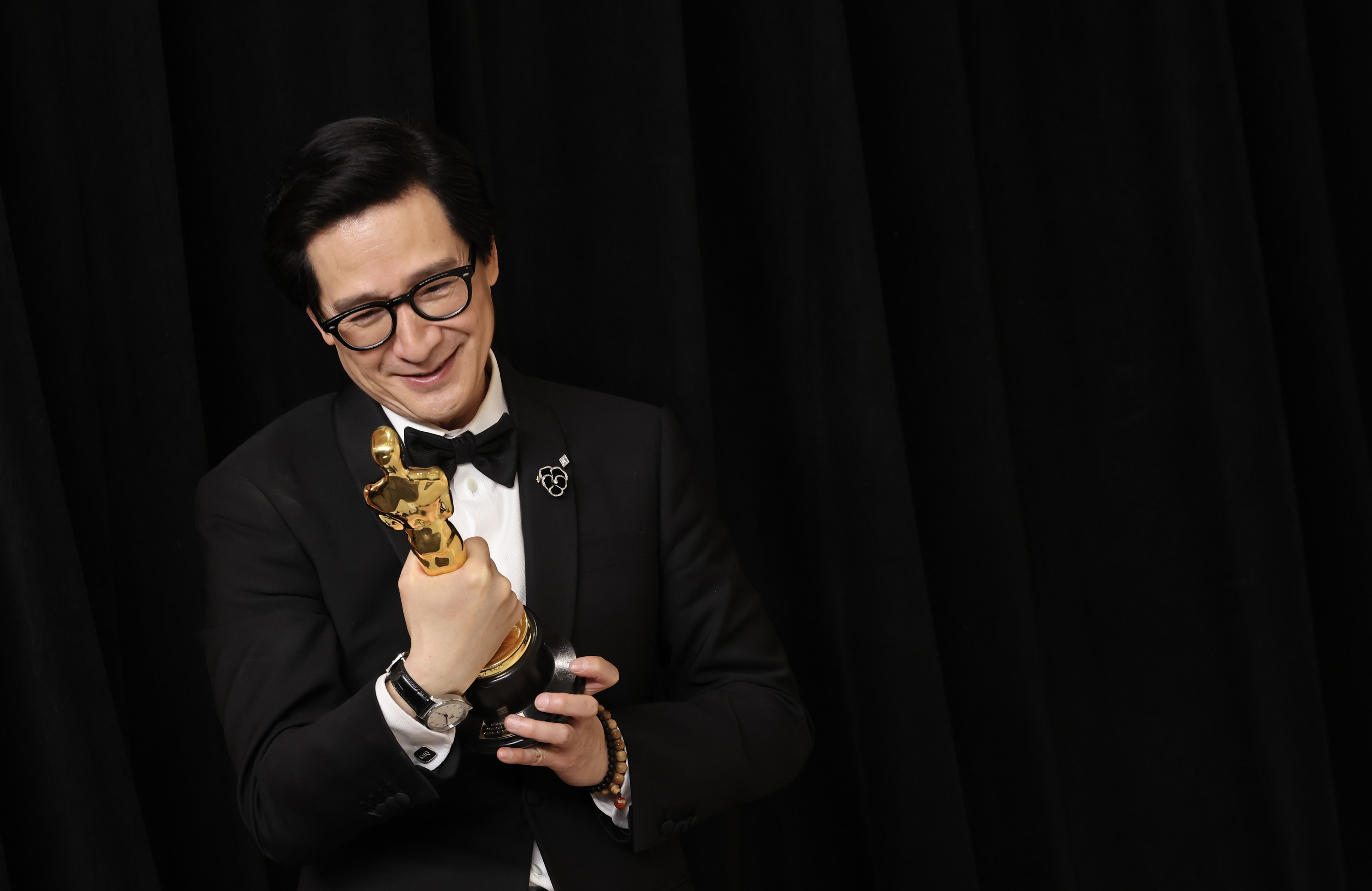 Ke Huy Quan poses in the press room during the 95th Annual Academy Awards