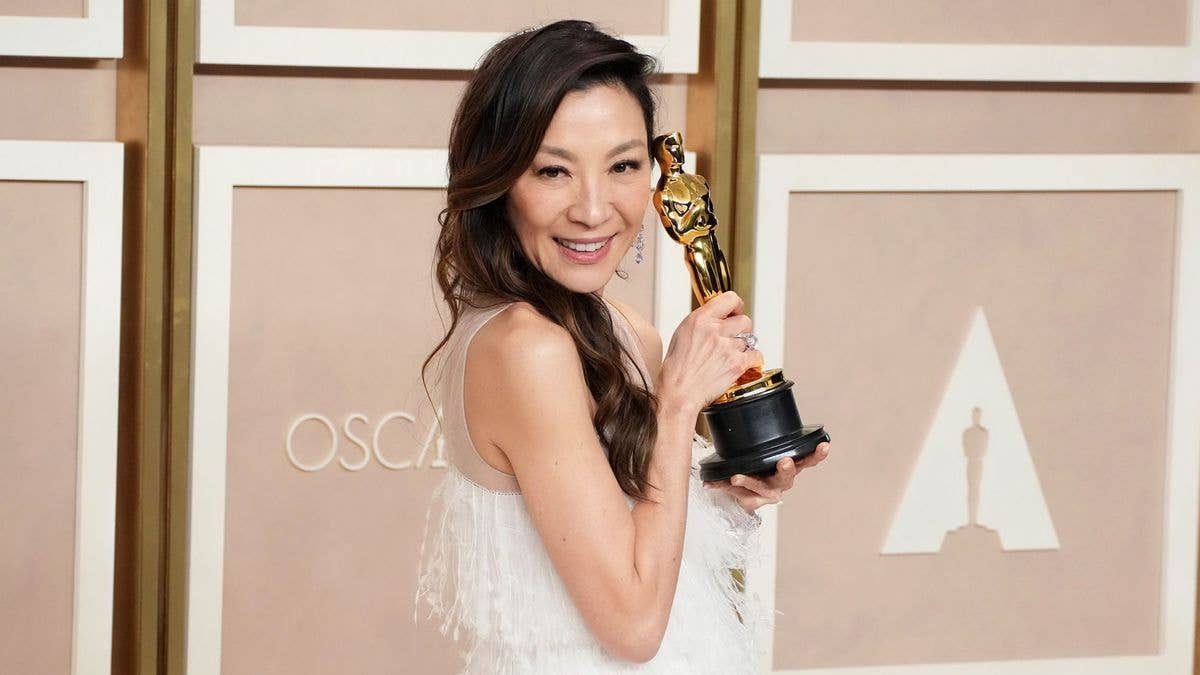 Yeoh is the second person of color to win the award after Halle Berry, and the first person of Asian descent. What does her win mean for Asians in Hollywood?