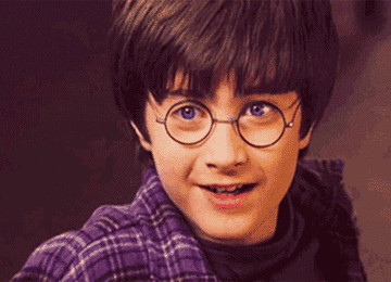 Daniel Radcliffe as Harry smiles in &quot;Harry Potter and the Sorcerer&#x27;s Stone&quot;