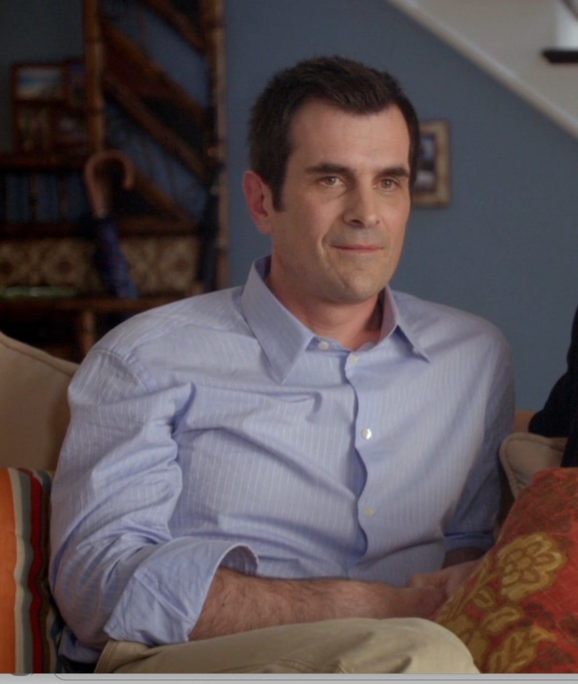 Ty Burrell as Phil Dunphy sits with Claire in &quot;Modern Family&quot;