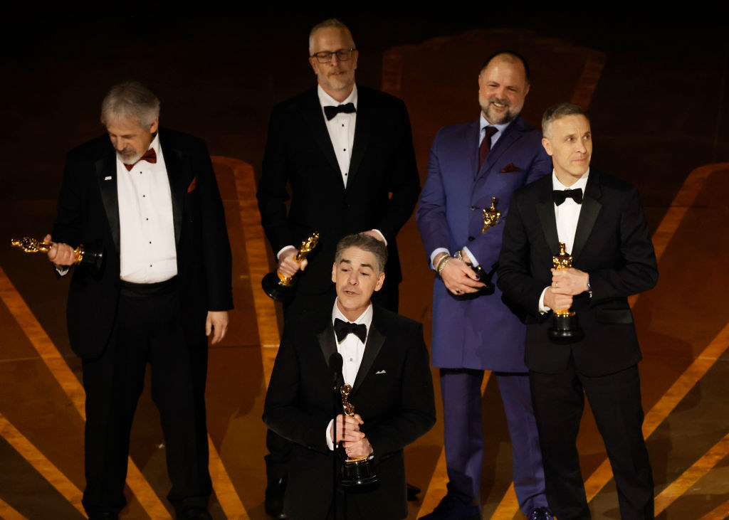 Mark Weingarten, Mark Taylor, Al Nelson, James Mather and Chris Burdon accept the Best Sound award for &quot;Top Gun: Maverick&quot;
