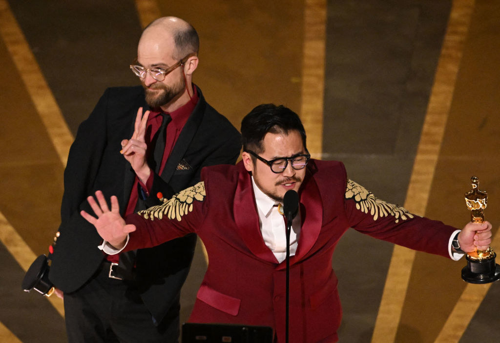 Daniel Scheinert and Daniel Kwan accept the Oscar for Best Original Screenplay for &quot;Everything Everywhere All at Once&quot; onstage