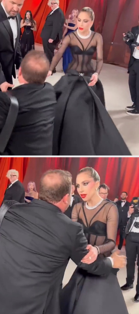 Gaga helping the photographer up