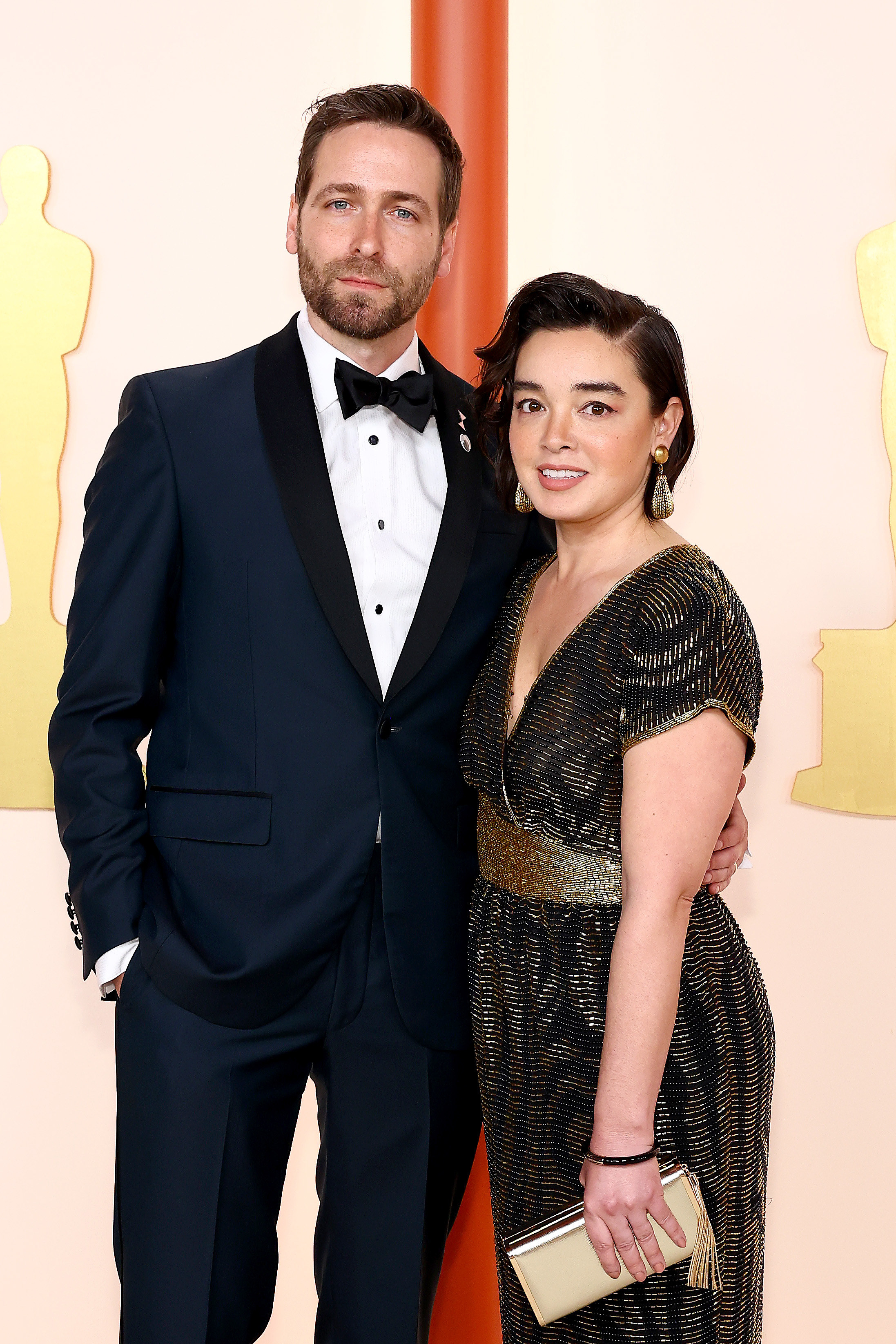 Paul poses on the Oscars red carpet with his wife
