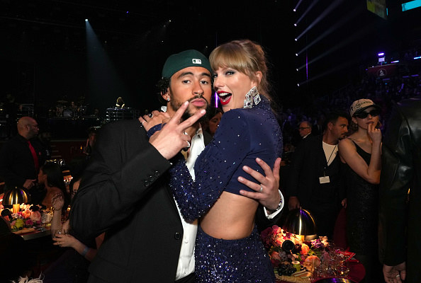 Bad Bunny and Taylor Swift pose for a photo together happily at the Grammys