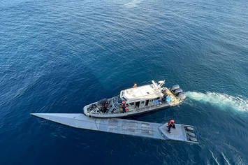 A cocaine submarine is seen in water
