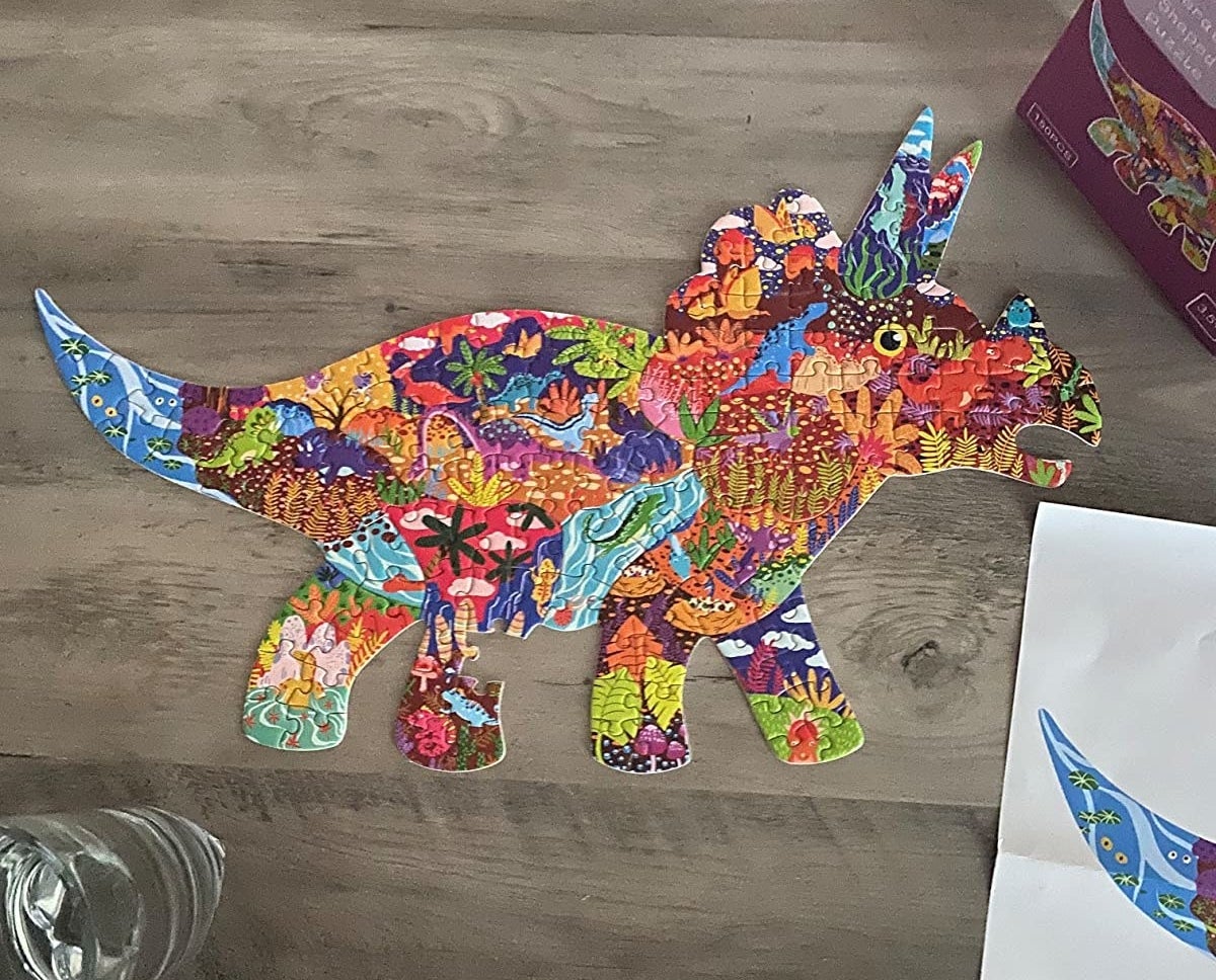 A colorful puzzle of a Triceratops
