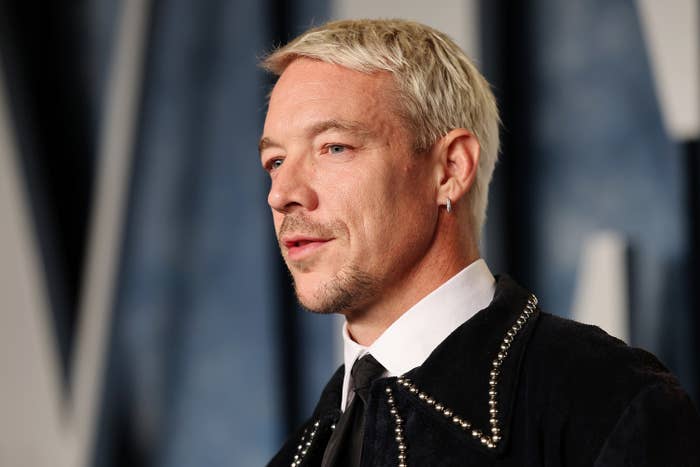 A closeup of Diplo at a red carpet event