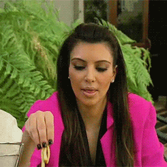 Kim Kardashian eating French fries.