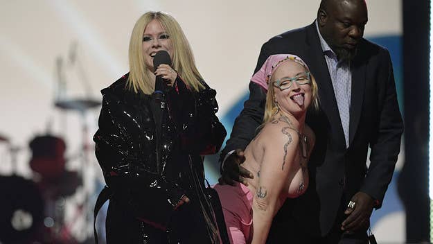 Last night at the Juno Awards in Edmonton, Alberta, a topless protestor ran the stage while Avril Lavigne was presenting. She was protesting the Greenbelt.