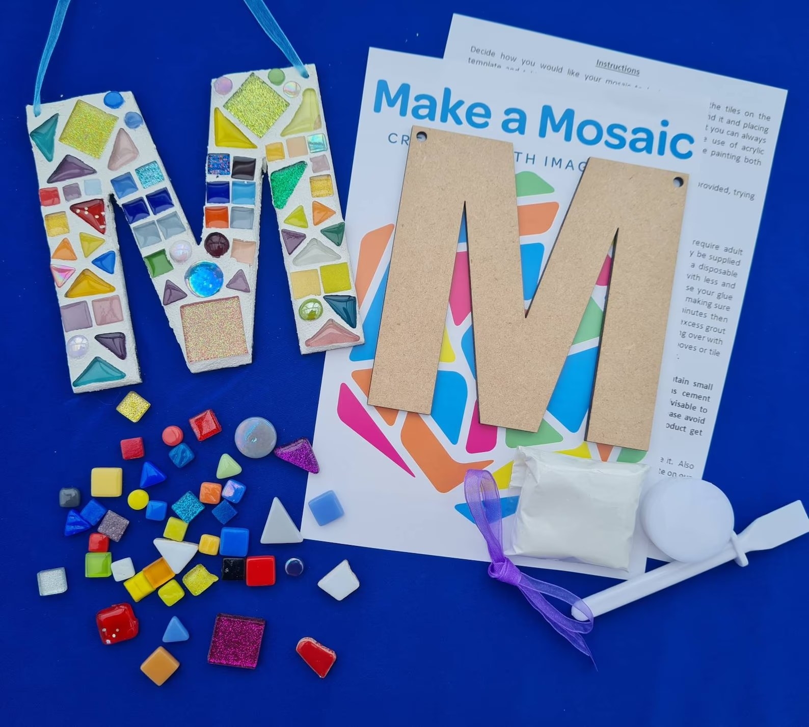 Complete mosaic letter craft kit using the letter M to show before and after results