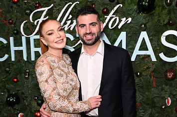 Lindsay Lohan and Bader Shammas attend Netflix’s Falling For Christmas Celebratory Holiday Fan Screening