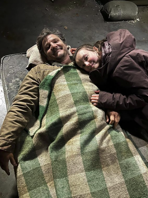 Behind-the-scenes photo of Pedro Pascal and Bella Ramsey from &quot;The Last of Us&quot;