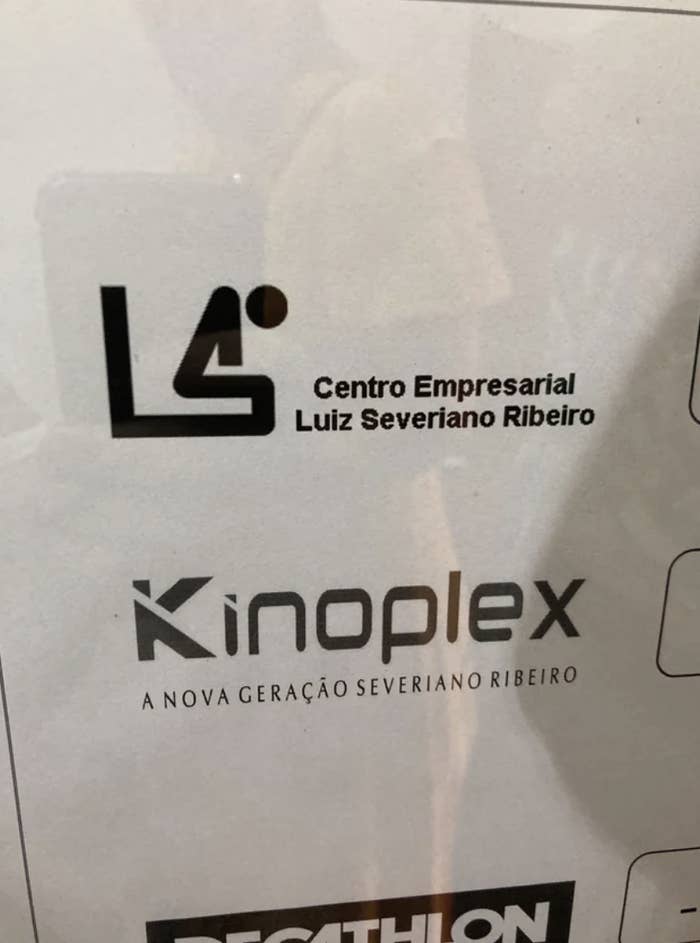 A logo that looks like someone sitting on a toilet