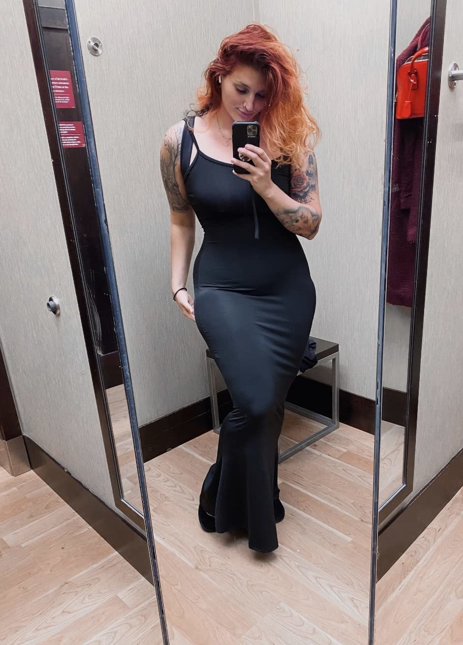 person wearing the cami dress in black