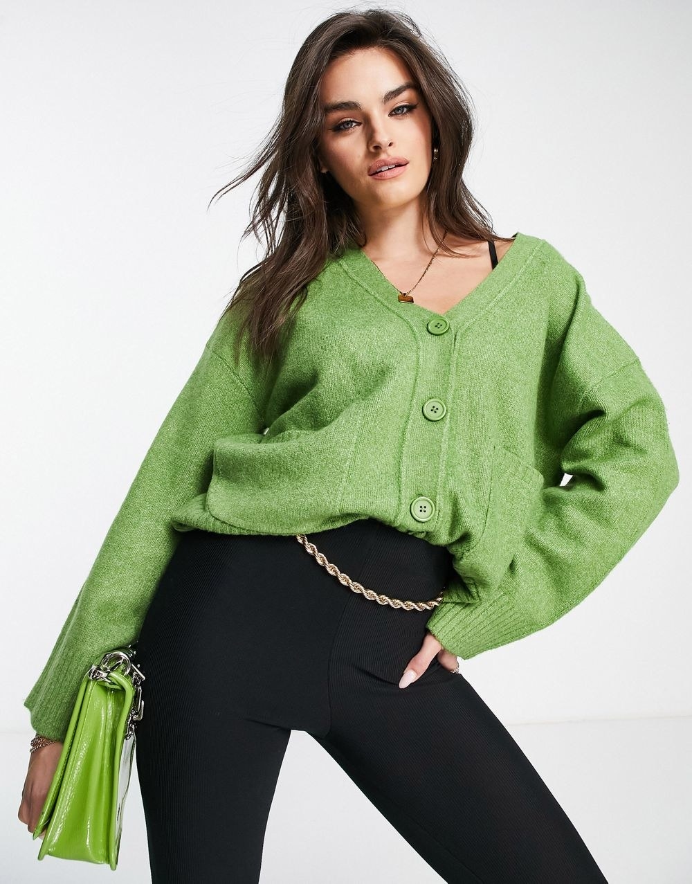 model wearing the cardigan in green