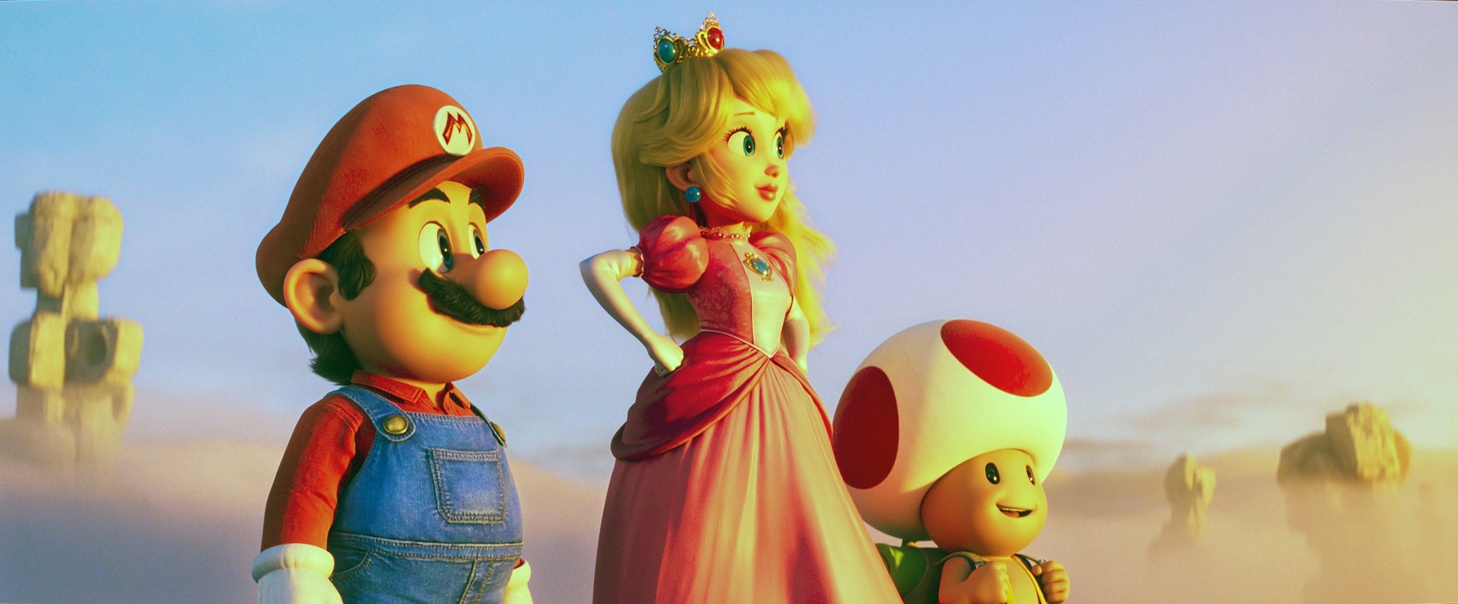 Mario, Peach, and Toad all stand together