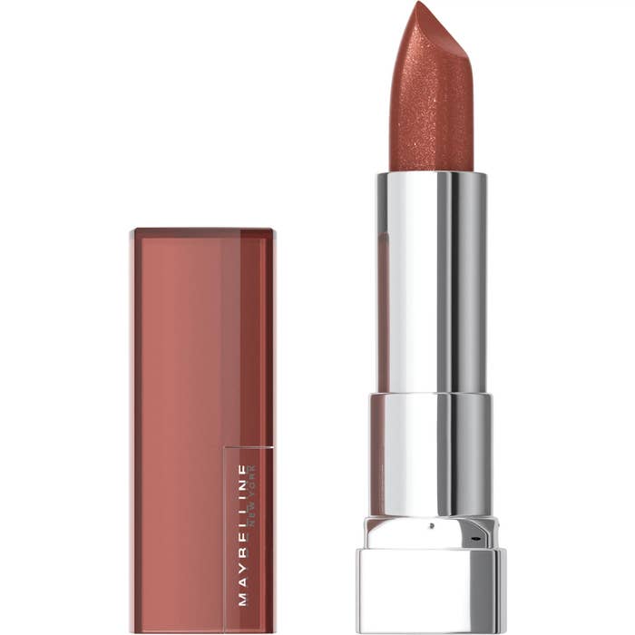 Copper charge cream lipstick bullet against white background