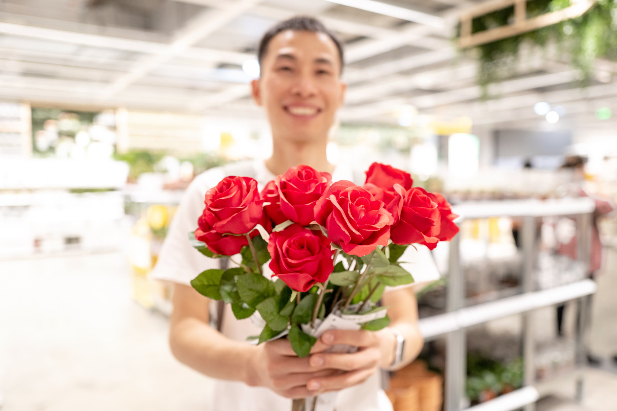 man holding roses