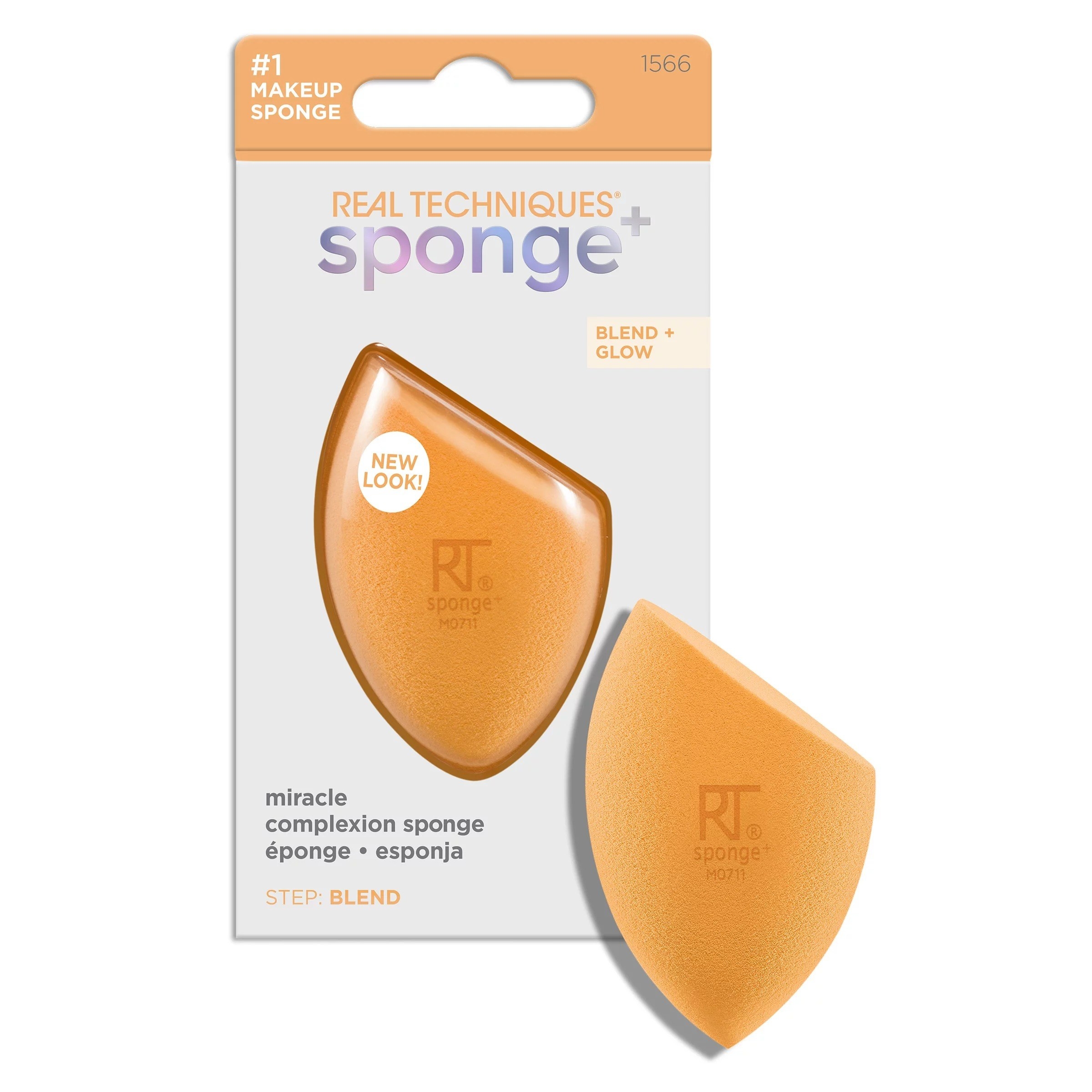 One orange beauty blender sponge in the package and another outside of it against a white background