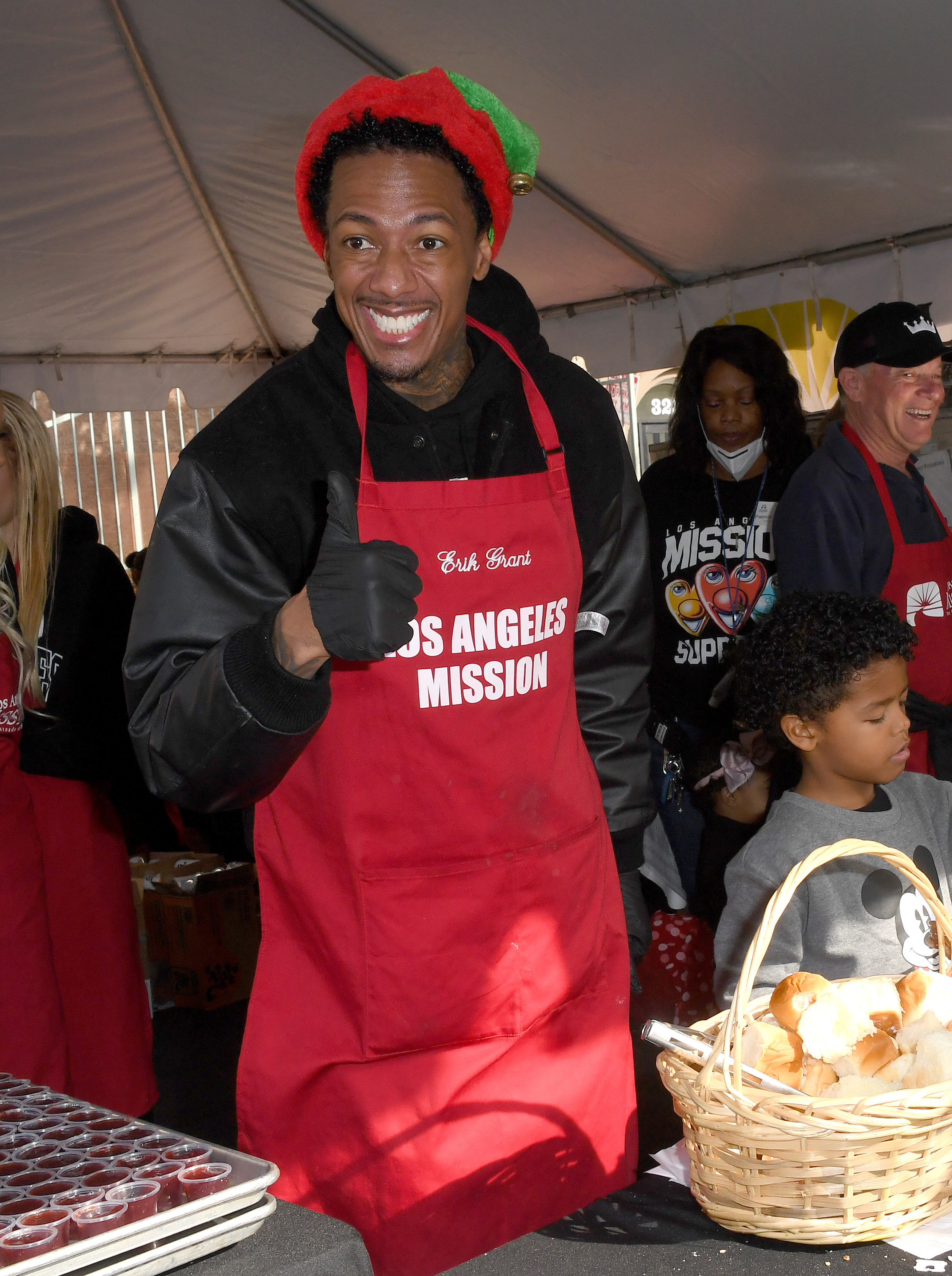 Nick giving a thumbs up as he volunteers at the Los Angeles Mission