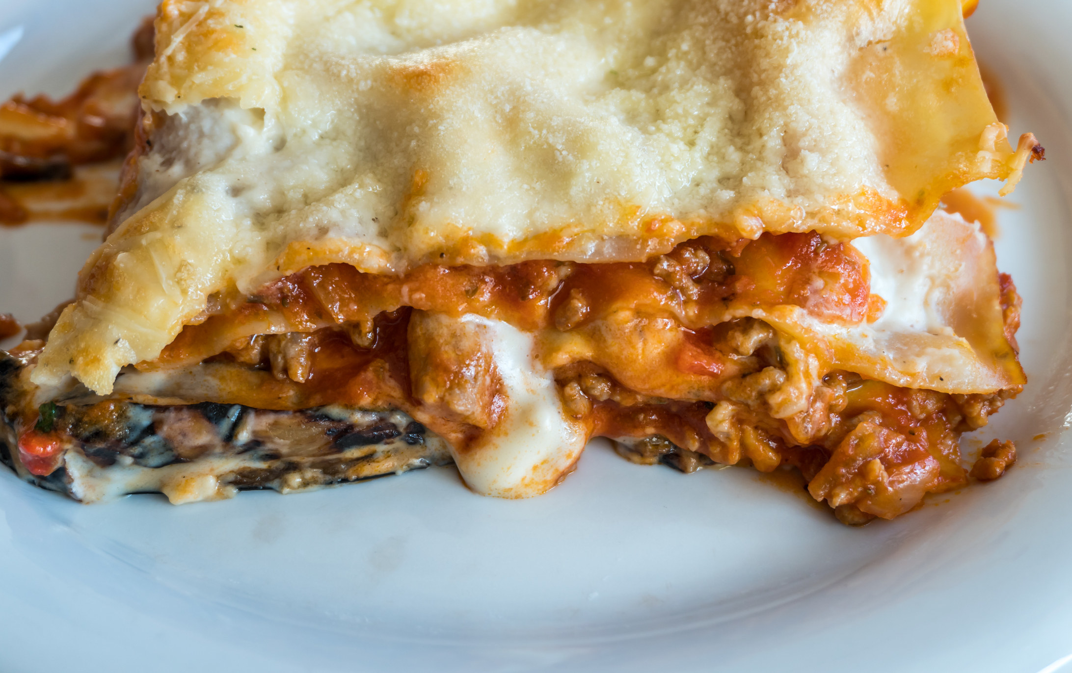 Close-up of plate of lasagna