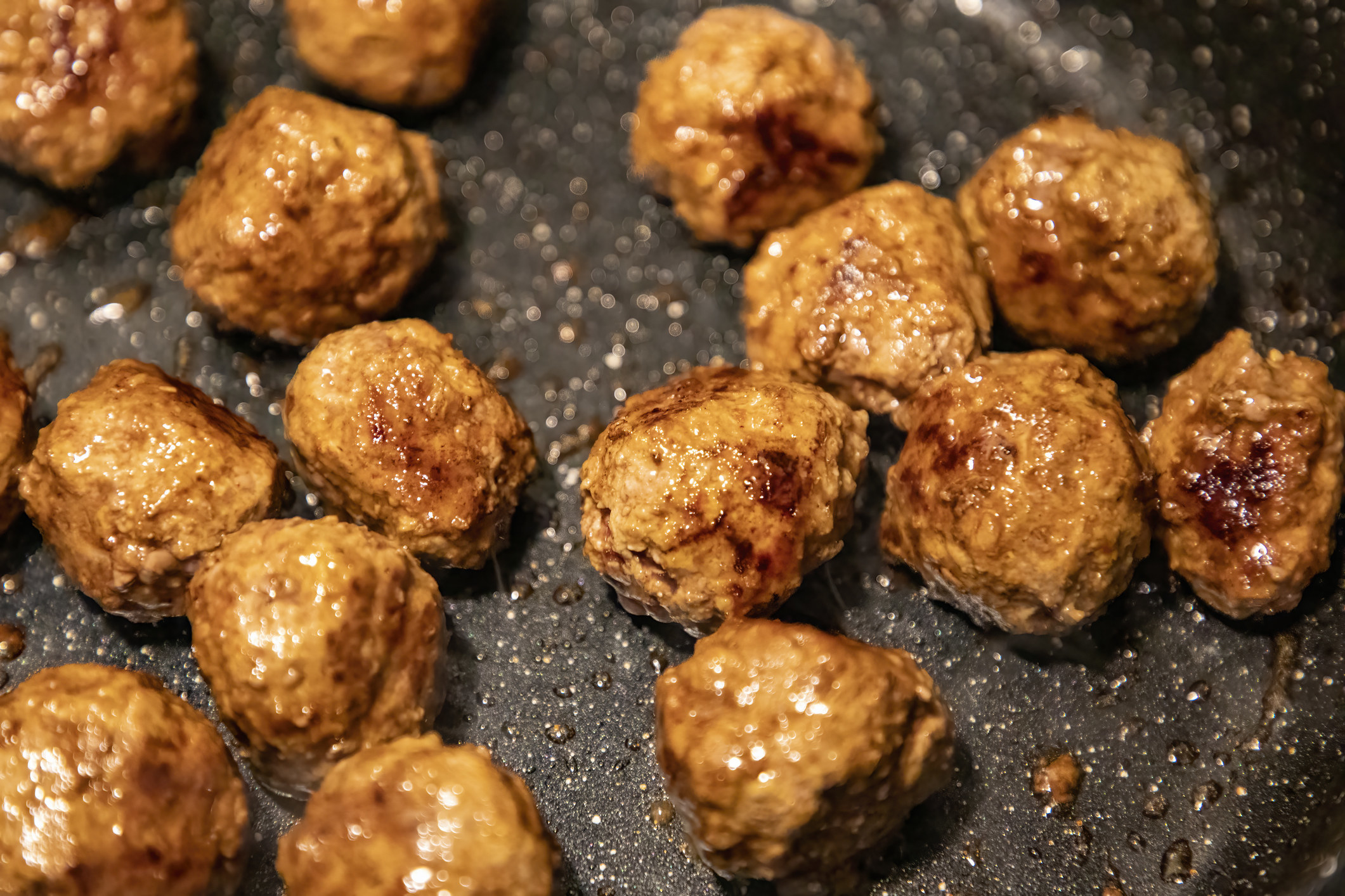 Meatballs frying