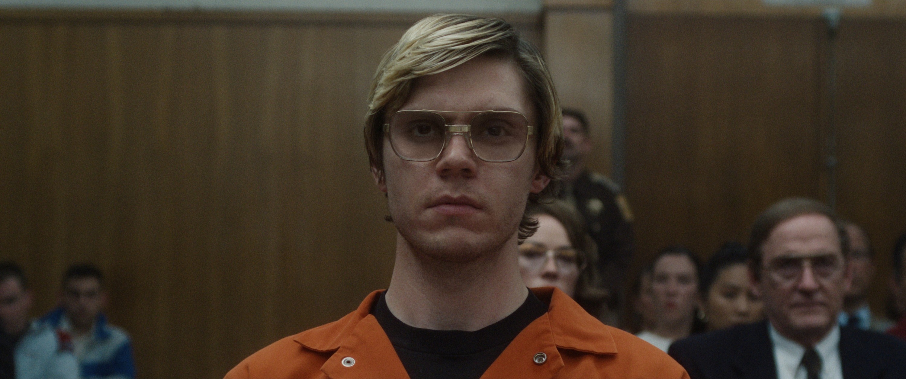 Evan Peters in a courtroom