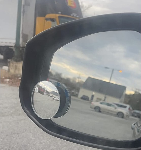 the product on a car side mirror