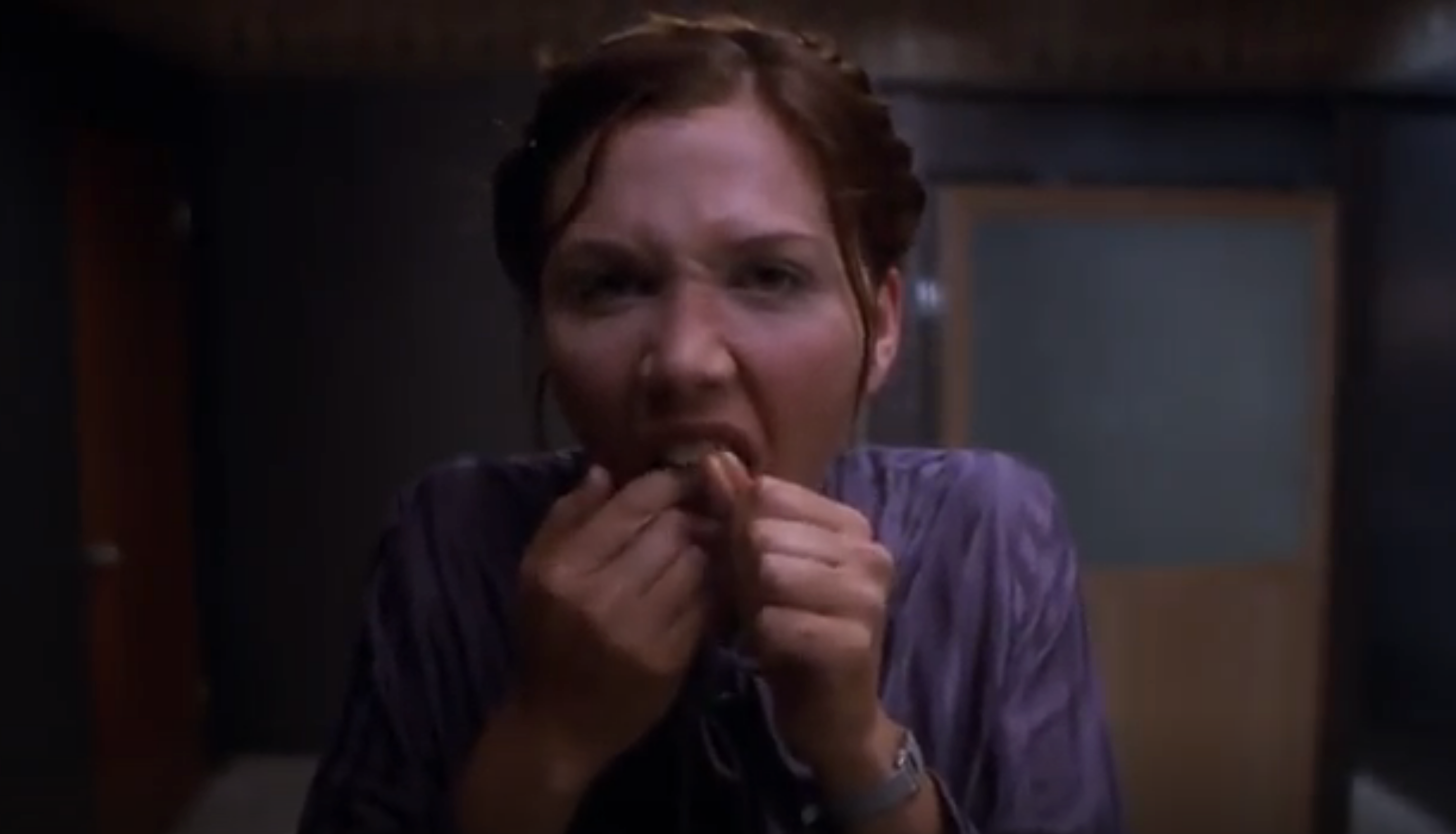 Maggie Gyllenhaal flossing her teeth in &quot;Secretary&quot;