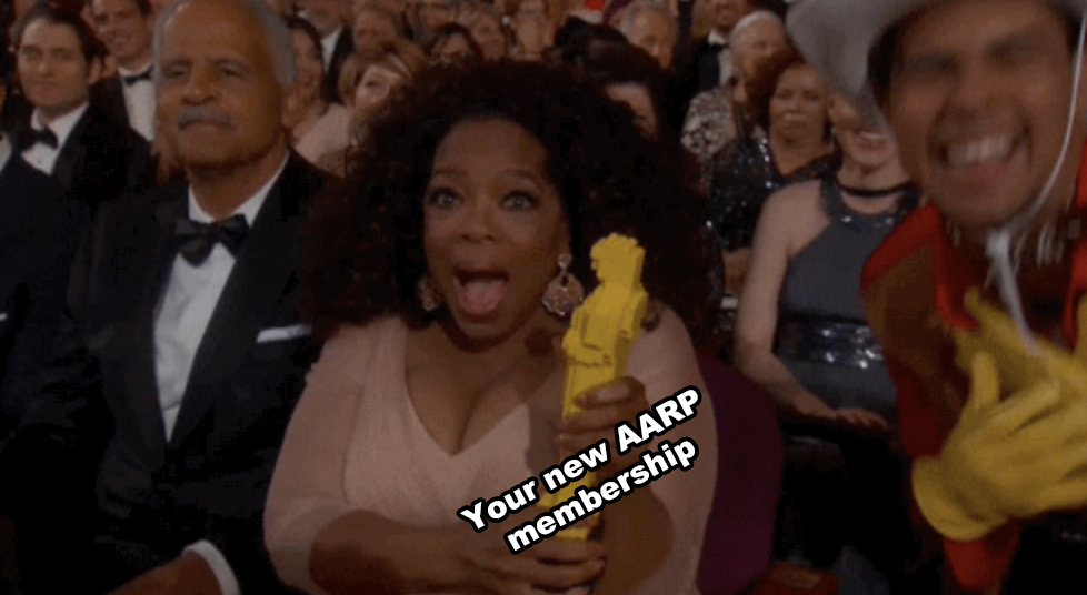 Oprah holding a fake Oscar built from Legos at the Oscars