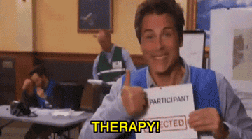 person with a thumbs up saying, therapy!