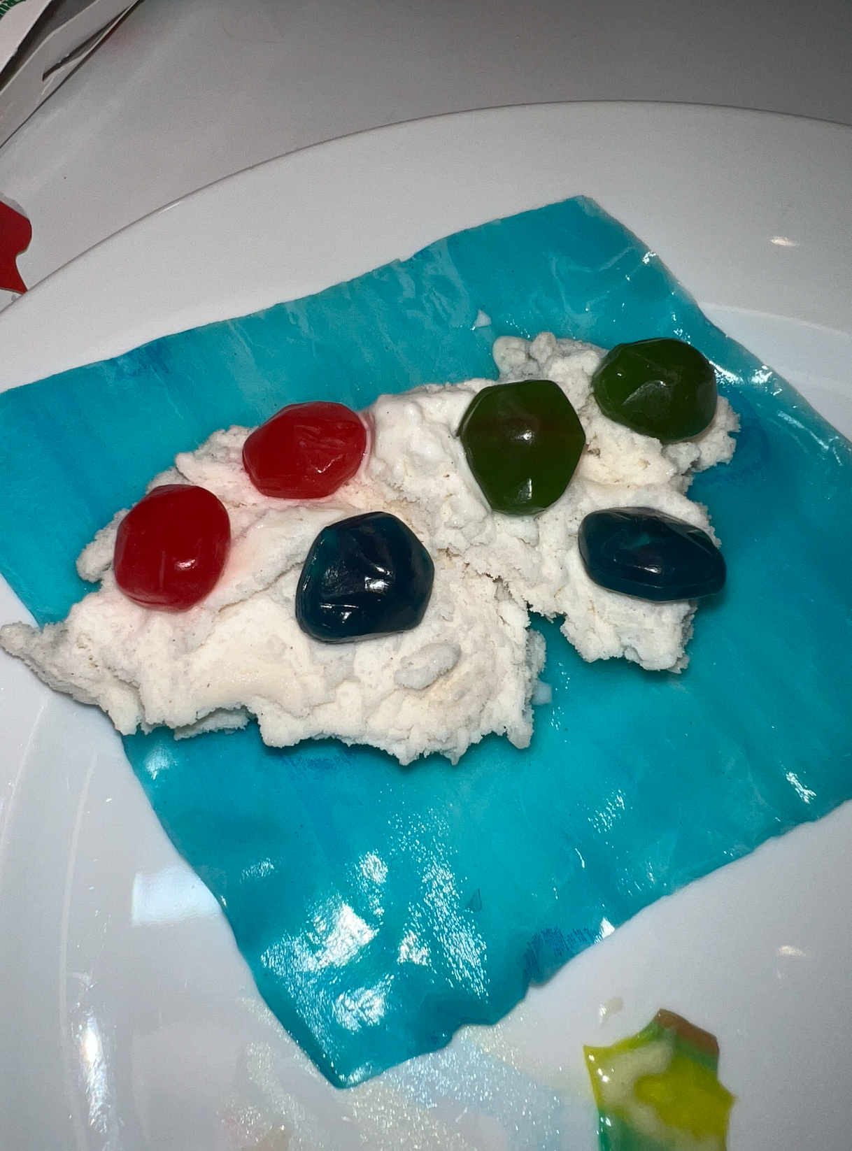 Gushers on top of the roll-up and ice cream