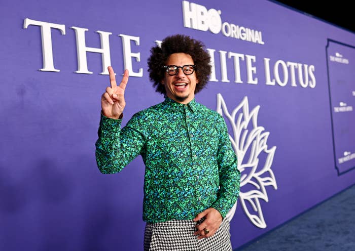 Eric giving a peace sign on the red carpet