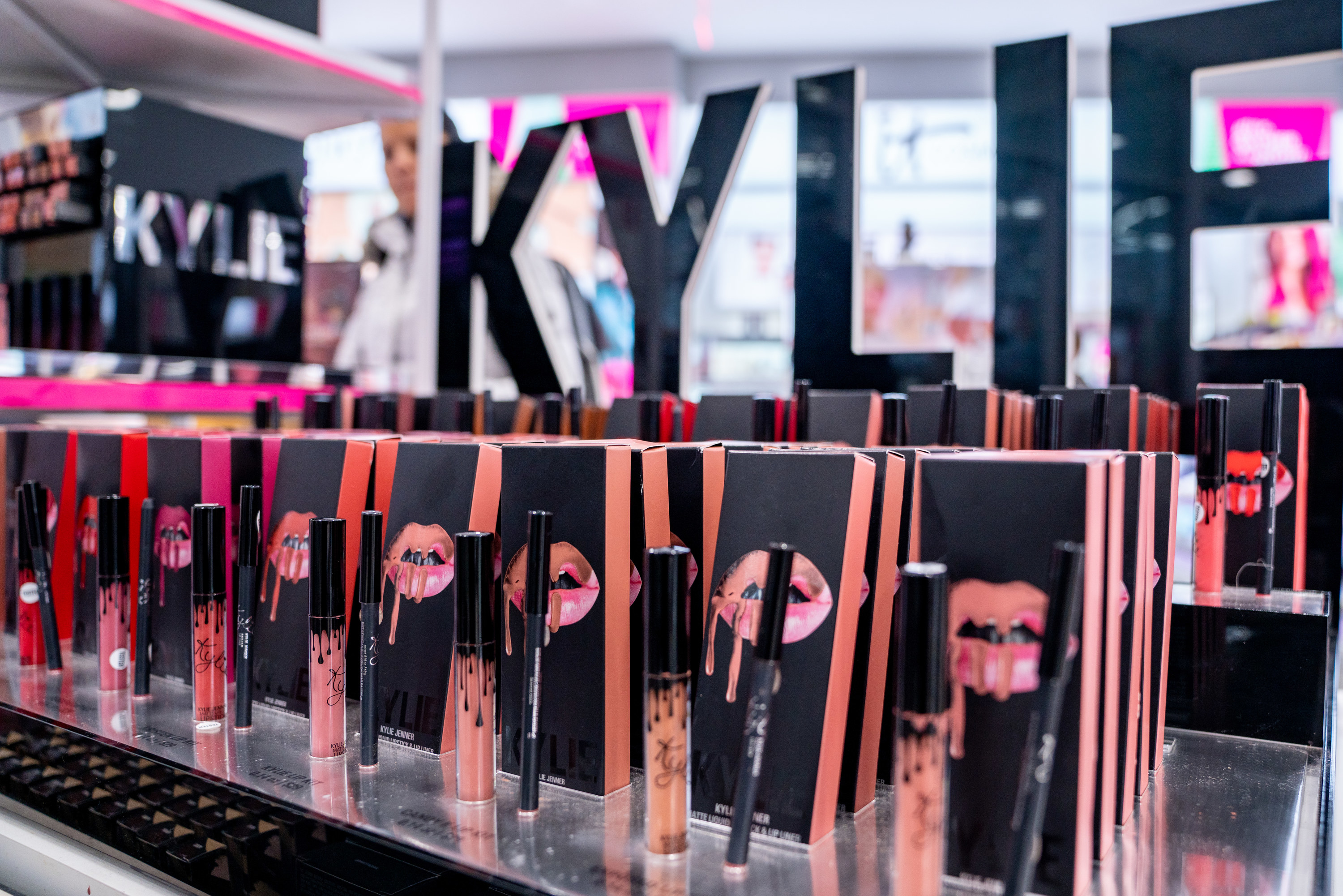 A display in a store showing Kylie Cosmetics lip kits