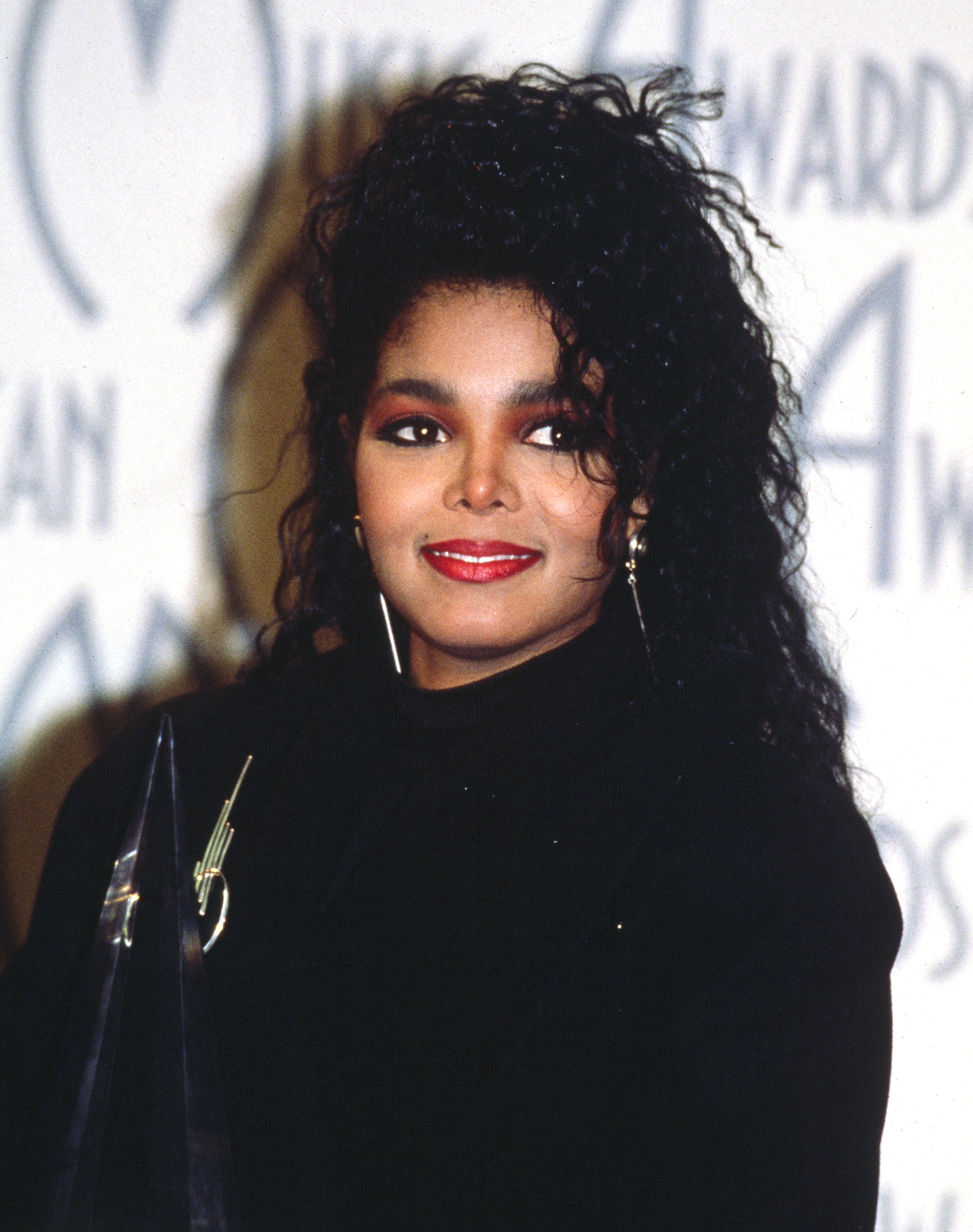An old photograph of Janet wearing all black