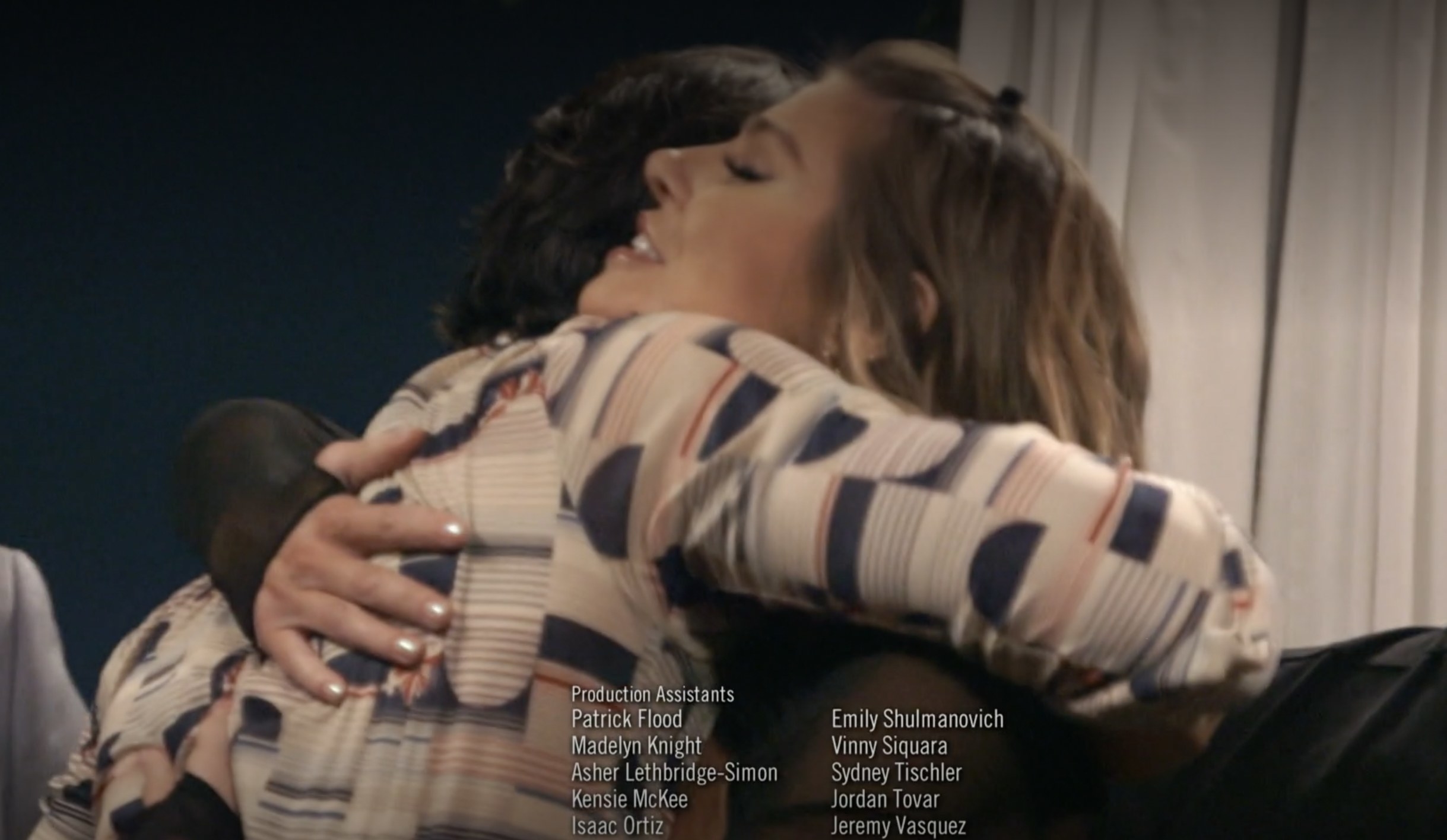 Sandoval and Raquel hugging