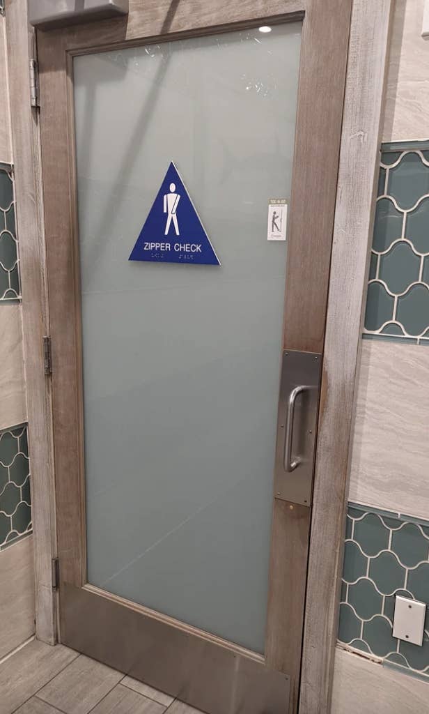A sign saying &quot;Zipper Check&quot;