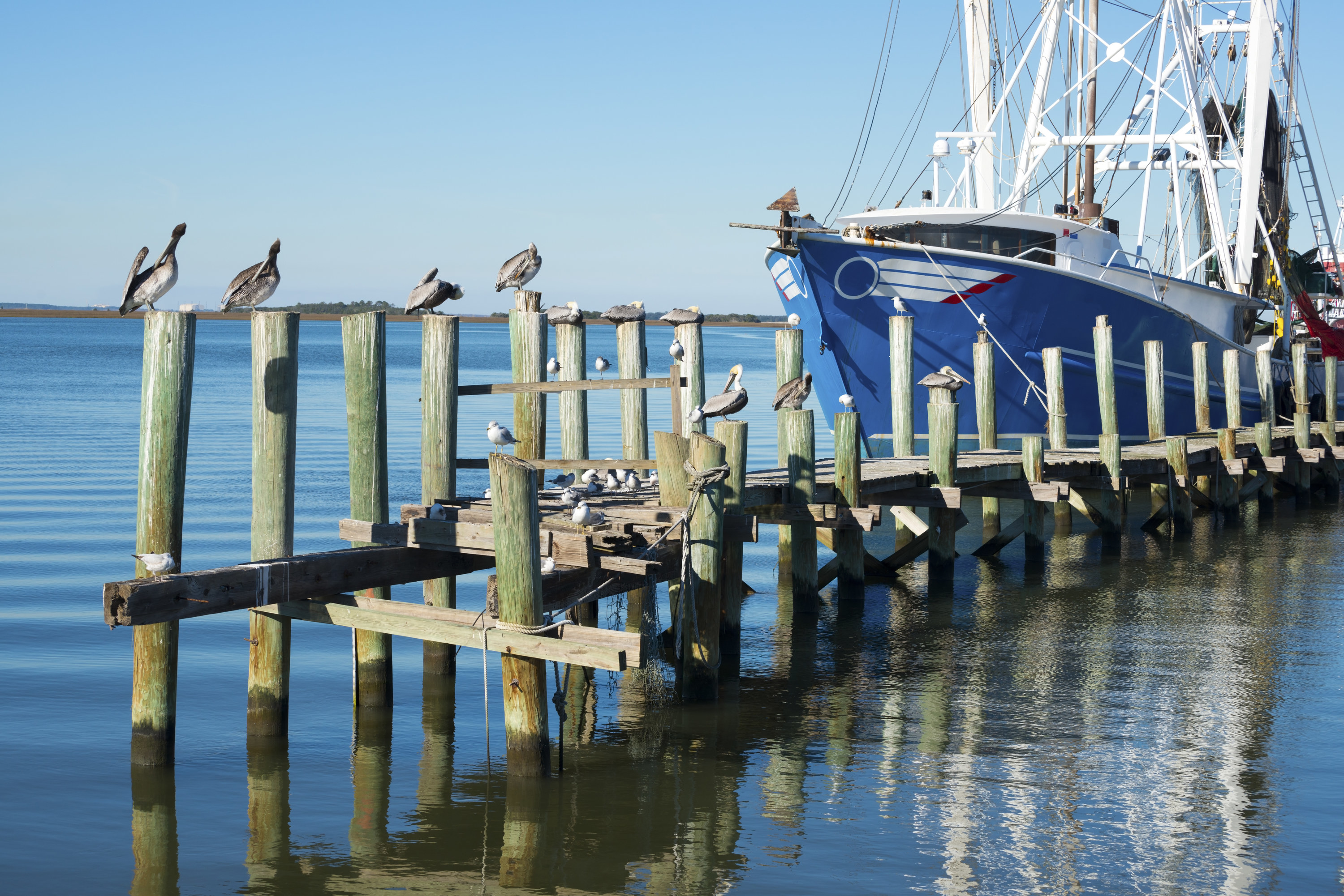 Boat on a long pier