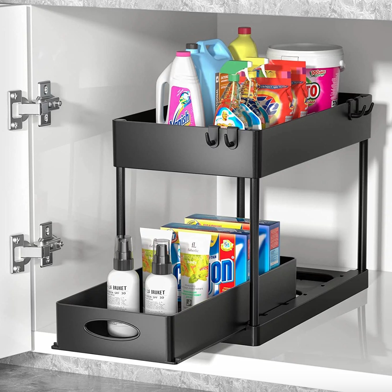 the black organizer under a sink filled with cleaning products. the lower tier is rolled out slightly