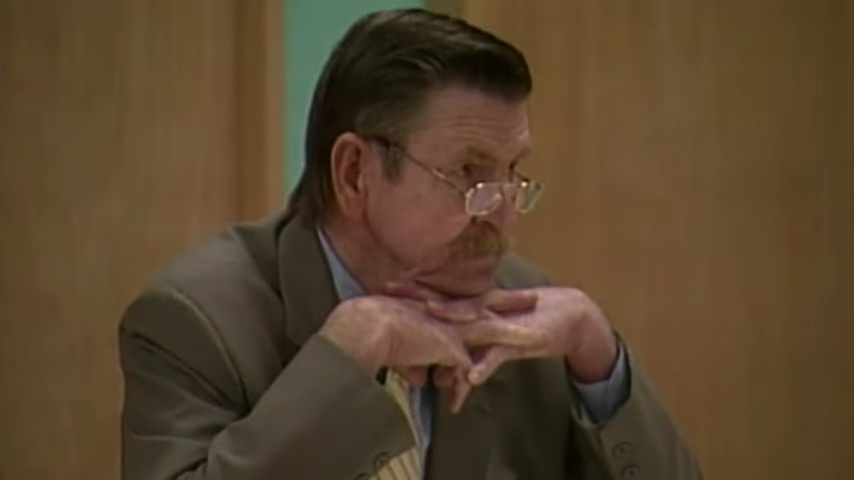 David Parker Ray in court, resting his chin on his hands