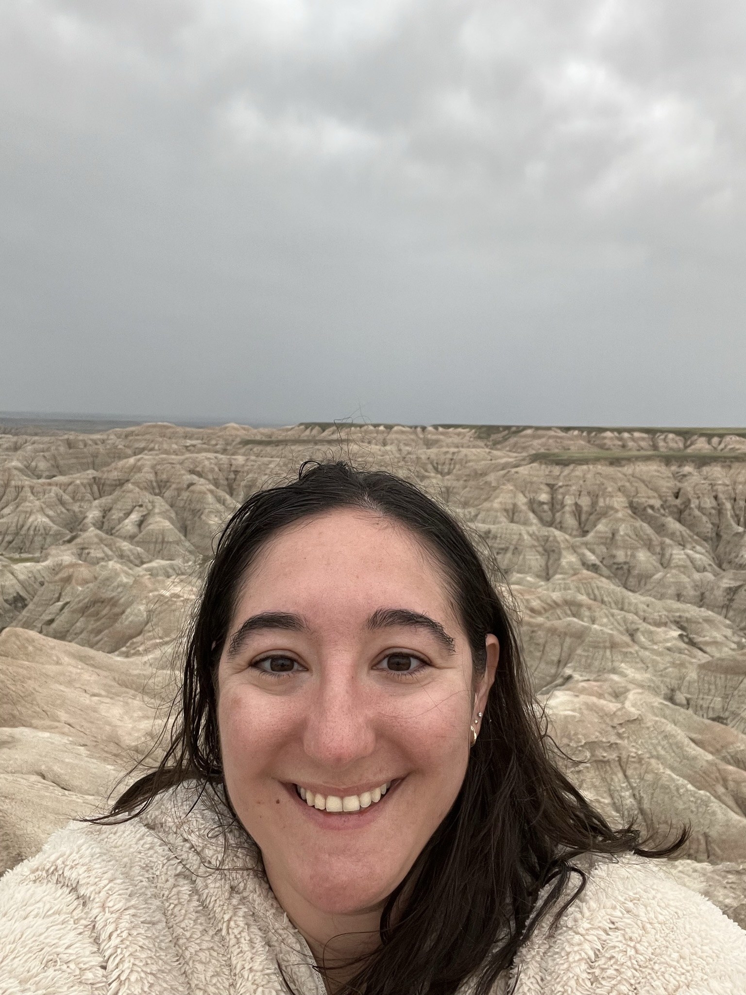 Woman taking selfie in front of Badlands